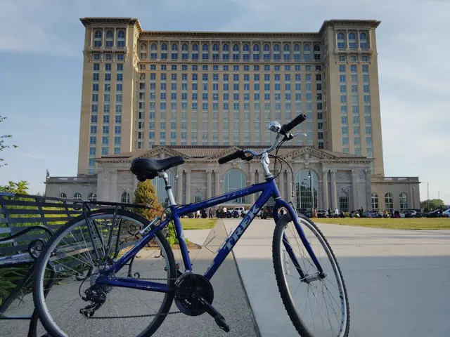 Blue mountain bike in a sunny plaza